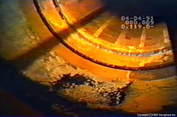 Video still showing a close-up of a 4-inch well screen